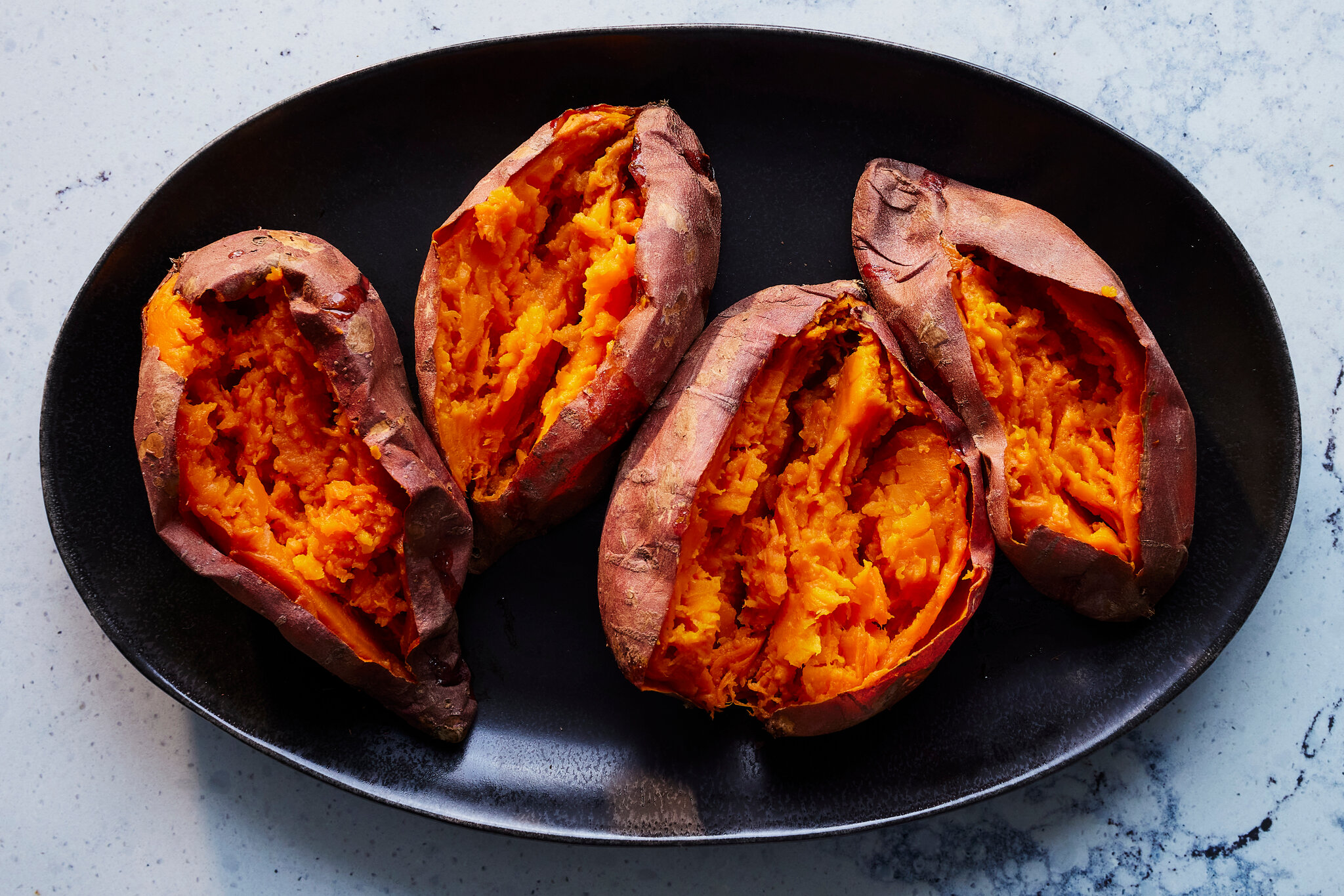 Whole roasted sweet potatoes